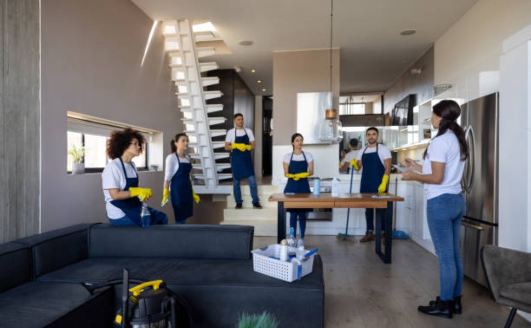 The professional cleaning team meets before starting their shift.