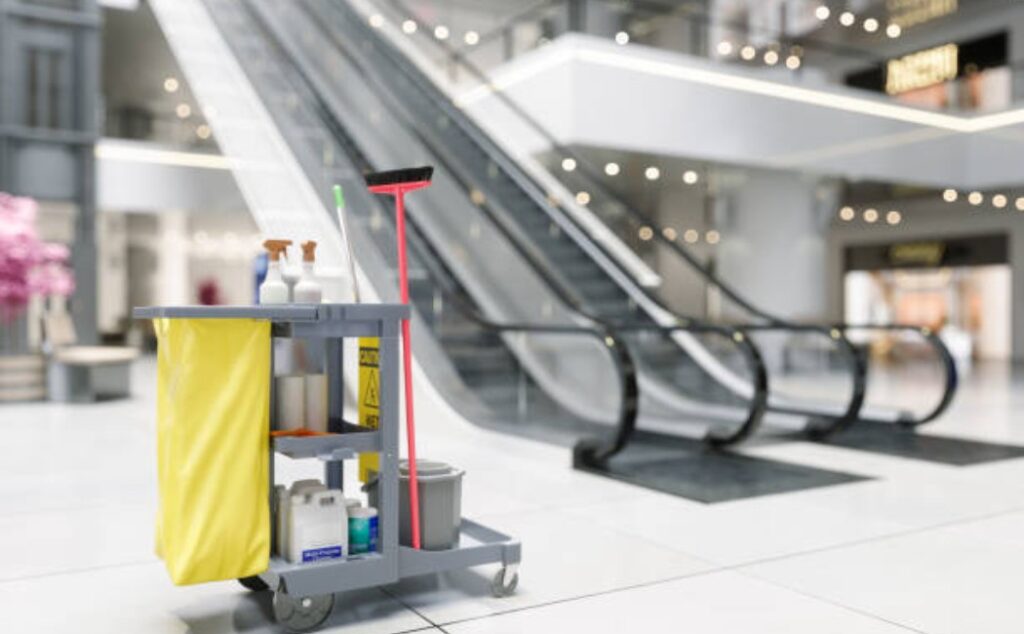 Commercial cleaning equipment is ready for floor maintenance in the mall.